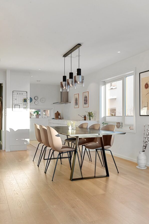 Top 13 Tables and Chairs for a Luxurious Dining Experience 8 Dining Table Design Wooden Glass Top 03 1